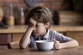 Unhappy little boy child refuse eating healthy food Royalty Free Stock Photo