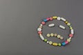 Unhappy smile created from colored pills. Medical concept Royalty Free Stock Photo