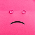 Unhappy sticky note. Pink paper