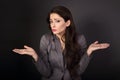 Unhappy stressed confusion business woman gesturing the hands ab Royalty Free Stock Photo