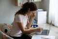 Unhappy stressed woman reading bad news in letter, holding paper Royalty Free Stock Photo