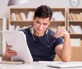 Unhappy student with too much to study Royalty Free Stock Photo