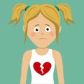 Unhappy teenager girl with broken heart on her t-shirt Royalty Free Stock Photo