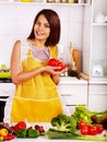 Unhappy tired woman at kitchen.