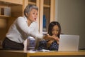 Upset business woman nagging and scolding on employee girl angry for computer mistake in office boss or chief authority and Royalty Free Stock Photo