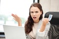 Unhappy woman with computer and euro cash money Royalty Free Stock Photo