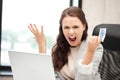 Unhappy woman with computer and euro cash money Royalty Free Stock Photo