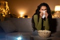 Unhappy Woman Crying Watching Drama Film Using Projector At Home Royalty Free Stock Photo