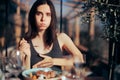 Unhappy Woman feeling Sick After Eating Spoiled Restaurant Food Royalty Free Stock Photo