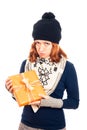 Unhappy woman with gift box Royalty Free Stock Photo