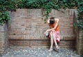 Unhappy woman in orange Royalty Free Stock Photo