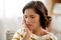 Unhappy woman suffering from toothache at home Royalty Free Stock Photo