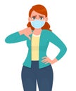 Unhappy woman wearing medical mask and showing thumbs down sign. Girl covering face protection from virus epidemic and gesturing Royalty Free Stock Photo