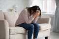 Upset biracial woman suffer from depression at home