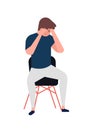 Unhappy young man sitting on chair. Depressed boy. Male character in depression, sorrow, sadness, distress, trouble Royalty Free Stock Photo