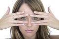 Unhappy Young Woman Peering Through Fingers