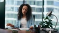 Woman worried work failure sitting office desk close up. Girl manager tired. Royalty Free Stock Photo