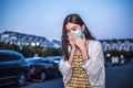 Unhealthy Asian woman sneezing and cough with protective face mask to protect Coronavirus or Covid-19 disease Royalty Free Stock Photo