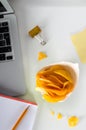 Unhealthy chips for snack at work. Food in the office Royalty Free Stock Photo