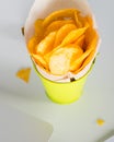 Unhealthy chips for snack at work. Food in the office Royalty Free Stock Photo