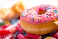 Unhealthy but delicious group of sweet sugar donut cakes and lot Royalty Free Stock Photo