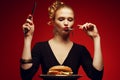 Unhealthy eating. Junk food concept. Portrait of eating lady Royalty Free Stock Photo