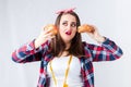 Unhealthy food fat woman concept, girl XXL between healthy and b Royalty Free Stock Photo