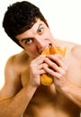 Unhealthy food - hungry man eating bread Royalty Free Stock Photo