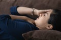 Unhealthy Indian woman suffer from headache at home