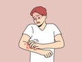 Unhealthy man scratch redness on arms