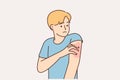 Unhealthy man scratching arm suffer from pox