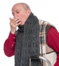 Unhealthy senior man coughing over white background