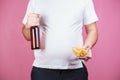 Unhealthy snack. fat man with beer and fast food Royalty Free Stock Photo