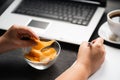 Unhealthy snacking, eating junk food at workplace