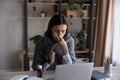 Unhealthy stressed young businesswoman using paper tissue. Royalty Free Stock Photo