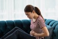 Unhealthy woman hands touching her belly, Looking like stomach pain Royalty Free Stock Photo