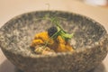 Uni and shirak and caviar japanese appetiser in a stone bowl Royalty Free Stock Photo