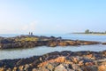 Unic rock formation with human interest near the beach Royalty Free Stock Photo