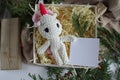 Unicorn. The gift box is on the table. Gifts for the New Year. New Year's decor. Free space for an inscription