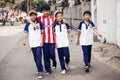 Unidentied boys walking on street in Ho Chi Minh