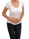 Unidentifiable older, mature woman with stomach pain, isolated on white background. Cramps, constipation etc.