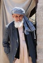 Unidentified Afghan Man with long beard standing in front of his home in Ovakent, Hatay