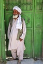 Unidentified Afghan Man standing in Traditional Outfit