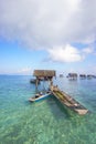 Unidentified Bajau Laut kids on a boat in Maiga Island on November 19, 2015. Royalty Free Stock Photo