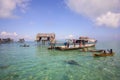 Unidentified Bajau Laut kids on a boat in Maiga Island on November 19, 2015. Royalty Free Stock Photo