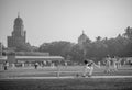 Unidentified batsman playing aggressive shot during cricket match in South Mumbai