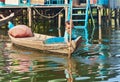 An unidentified boy on a boat floating on Tonle Sap lake Royalty Free Stock Photo