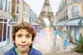 Unidentified boy look at paris graffiti on the wall