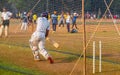 Unidentified boy practicing batting to improve cricketing skills at Mumbai ground Royalty Free Stock Photo