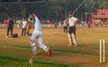 Unidentified boy practicing batting to improve cricketing skills at Mumbai ground Royalty Free Stock Photo